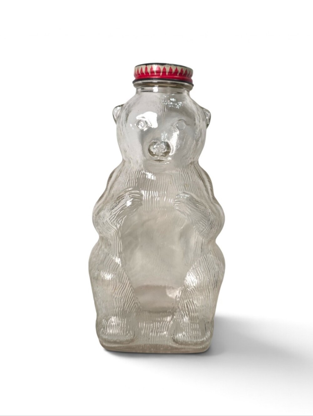 Vintage Snow Crest Clear Glass Bear Jar Bank with Red Metal Lid